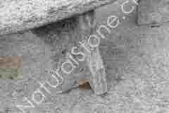 Granittisch-Gottardo-rund-Fuss-Halbkreuzfuss-links